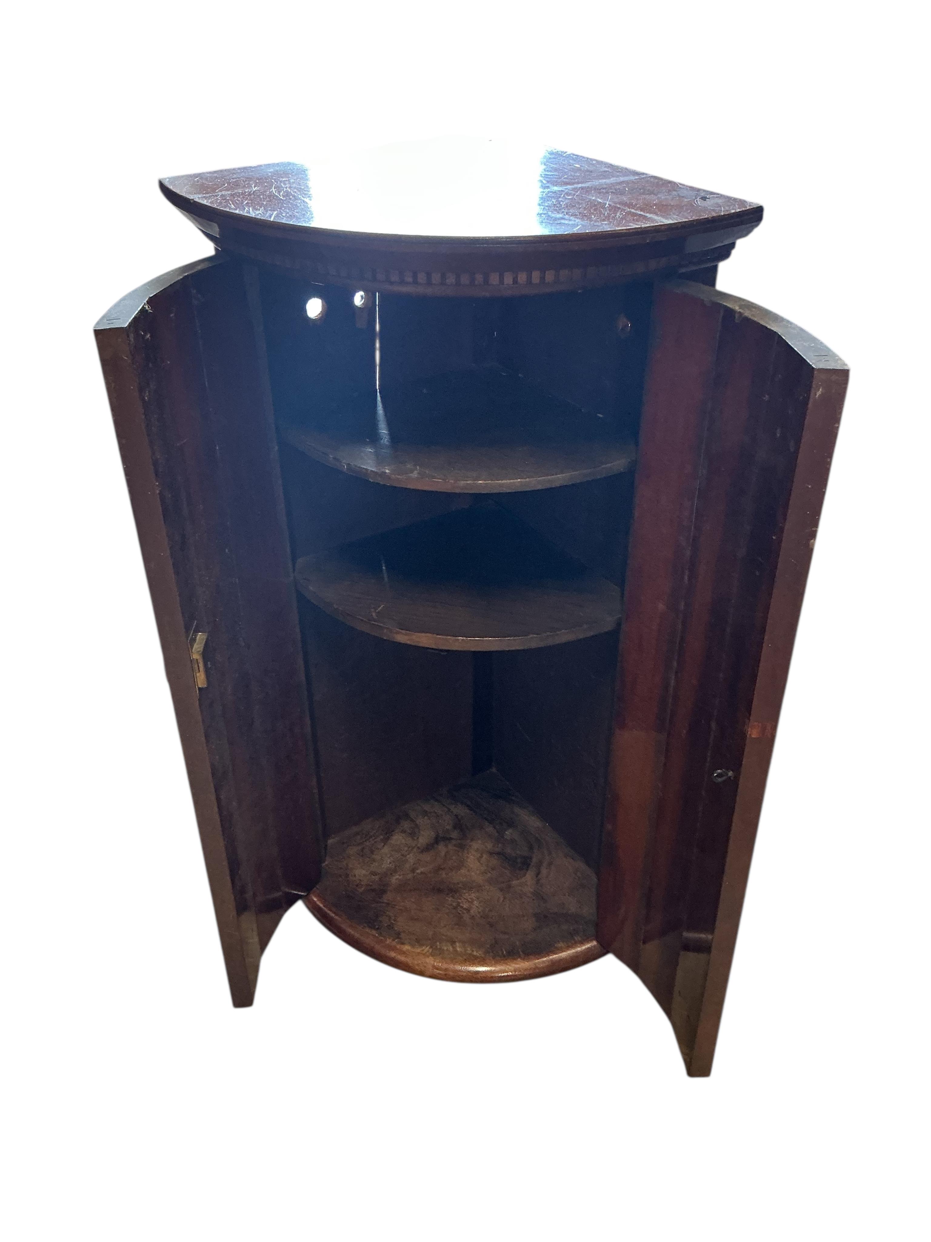 A nest of three mid century rectangular tables, width 60cm, depth 36cm, height 53cm, together with a small George III style mahogany hanging corner cupboard